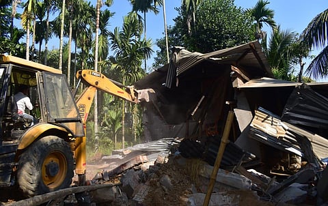 Image shows the continued eviction drive in Lutumari Reserve Forest