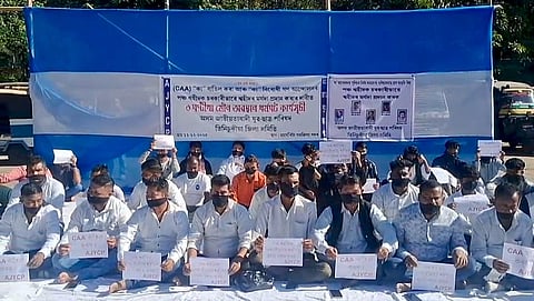 Image of the silent sit-in protest organised by the AJYCP in Margherita