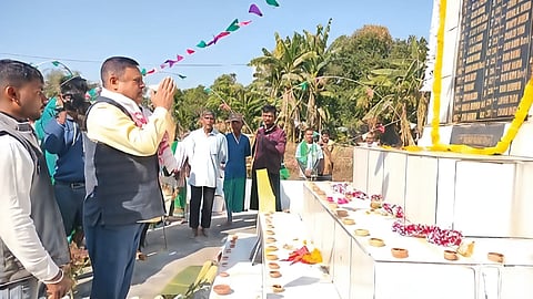 Image of MLA Pramod Borthakur paying homage to the victims of the Sonajuli Massacre