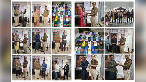 Image of Nagaon Police personnel handing over the recovered mobile phones to their owners
