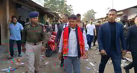 Image of Karbi Anglong CEM Tuliram Ronghang's visit to the fire-hit markets in Kheroni