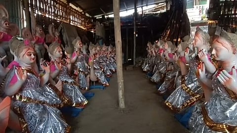 Goddess Saraswati idols prepared by artisans at a workshop in Hojai's Lanka
