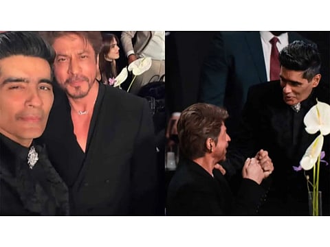 SRK appears dapper in black ensemble at Dubai event, Manish Malhotra catches up