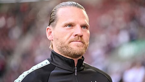 head coach Eugen Polanski 