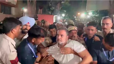 Opposition leaders dragged into custody and booked under FIRs after launching a daylong sit-in against the Chief Election Commissioner.