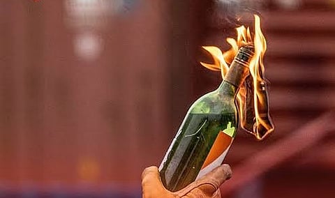 hurl petrol bomb 