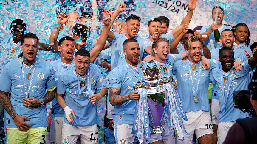 Manchester City win historic fourth Premier League title in a row