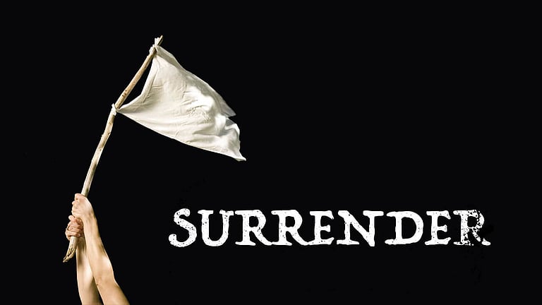 ULFA leader Arunoday Dohotia and his PSO surrender