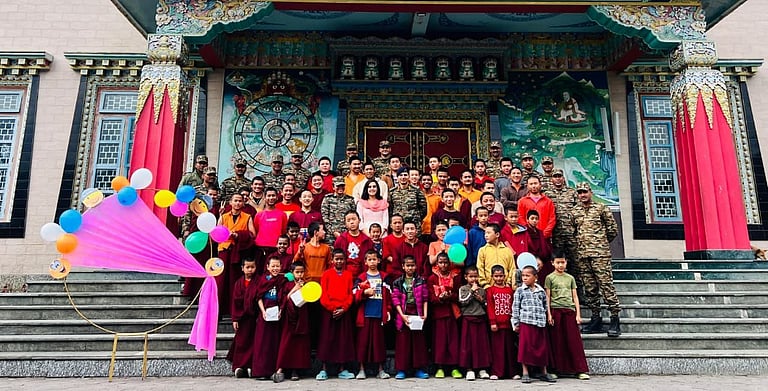 Army celebrates International Day of Happiness with monks