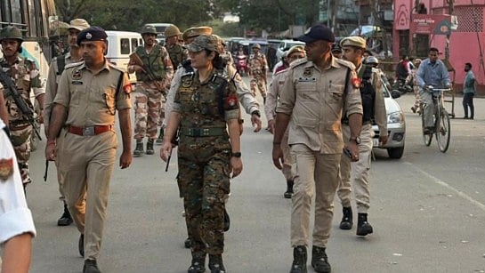 Police conduct flag march in Nazira