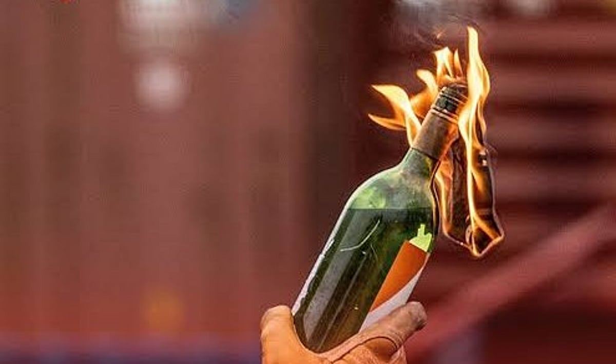 Person Riding Nuke Masked Duo Hurl Petrol Bomb at ED Office in Shillong