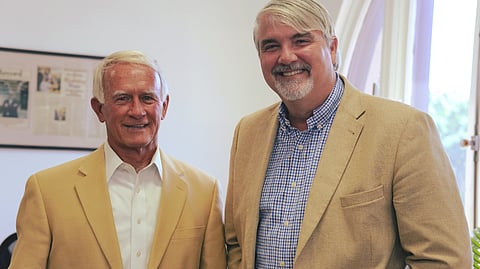 Retired Judge Gary Arnold (left) visits Restore Hope headquarters to talk to Paul Chapman (right) and the Smart Justice team 