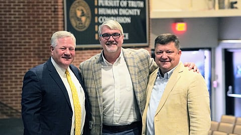 Harding University President Micheal Williams, Restore Hope Executive Director Paul Chapman, and Harding University Director of Community Connections Andrew Baker