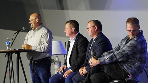 A panel of local leaders in Russellville talks to out-of-state guests from Casey Family Programs about what HopeHub has done for their community. From left to right: 100 Families Initiative Community Success Manager Jeff Piker, Mayor Fred Teague, Police Chief David Ewing, and Journey Church Lead Pastor Steve Bullard.