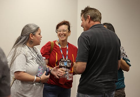 Community service providers connect at a monthly alliance meeting.