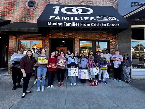 Students from Union High School bring donations to 100 Families Initiative Office