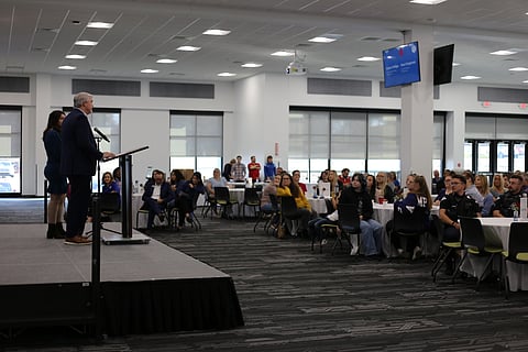 Karen Phillips, Chief Operations Officer Restore Hope and Paul Chapman, Executive Director of Restore Hope sharing data at the 100 Families Initiative of Sebastian and Crawford county Appreciation Event.