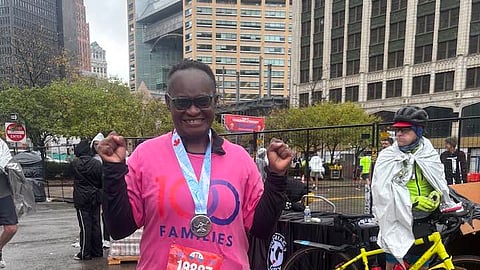 Dr. Eleanore Kue after completing the Detroit Free Press International Marathon.