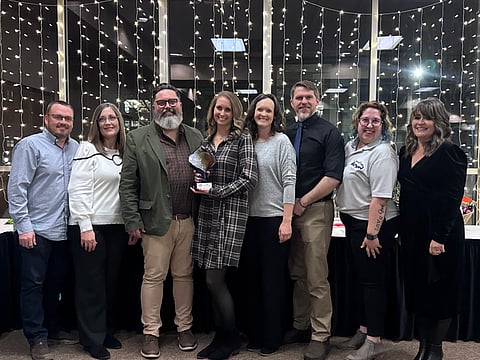 Kerry and Matt Bewley, Project Community Founders with the Business of the Year Award.
