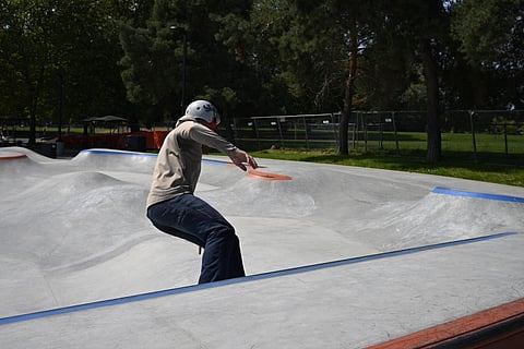 A skater tries out the new skate park in Rainier Beach.