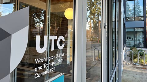 UTC offices' exterior door with sign.