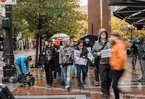 Slow Internet Walk to City Hall: An Absurd Procession for Municipal Broadband