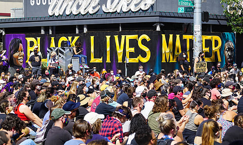 Photo Essay: "4th of YouLie" Rally Spotlights Central District Gentrification, Exclusionary History