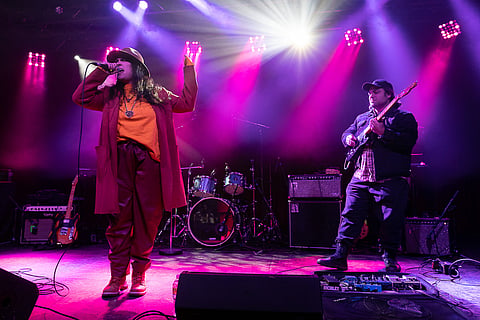 Julie-C (left) performs on stage alongside Michaud Savage (right). (Photo: Ronnie Estoque)