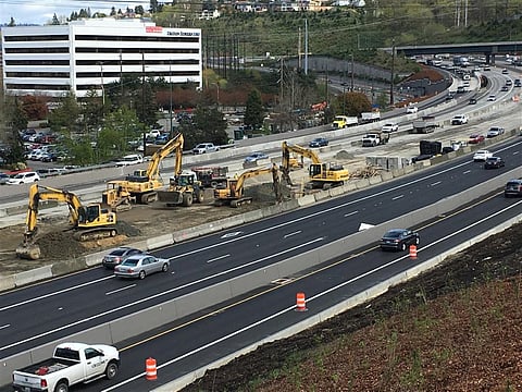 Crews preparing subgrade and installing drainage in the median work zone on Interstate 405 as part of the I-405/SR 167 Interchange Direct Connector Project in Renton in 2018. Photo is attributed to WADOT (under a Creative Commons, BY-NC-ND 2.0 DEED license.)