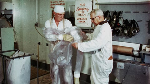 An archive image of a Hanford worker suiting up in protective gear from the film "Richland." (Photo: US Department of Energy Hanford Collection, courtesy Komsomol Films)