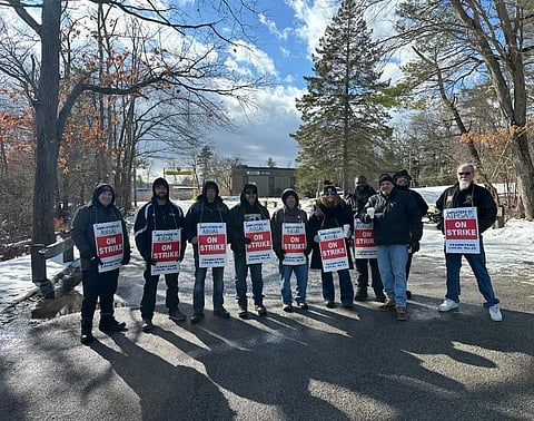 Workers on picket line. 