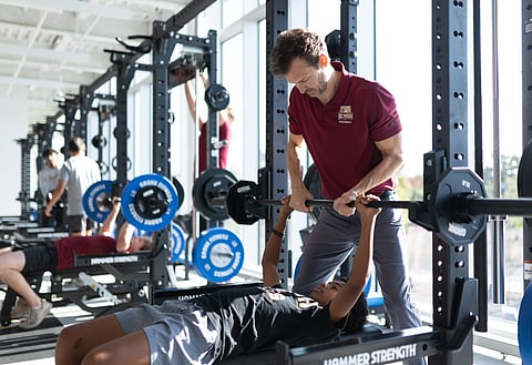 Steve Kiely, head strength and conditioning coach at Boston College High School, seeks to help students learn how to care for their bodies and minds in a holistic way.