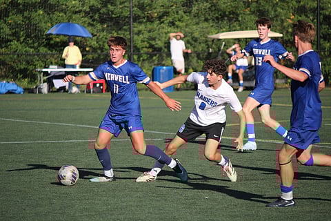 The Norwell High School boys varsity soccer team edged Dover-Sherborn in a close 3–2 match on September 20. 