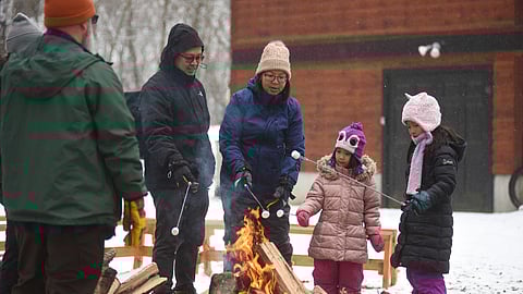 Families enjoy winter hikes, s'mores, and hot cocoa during Hale’s Winter Family Fun Day in Westwood, Massachusetts.