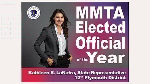 Kathy lanatra, a woman with dark hair wearing a gray blazer and a white button down shirt poses with the words MMTA Elected Official of the Year across the graphic