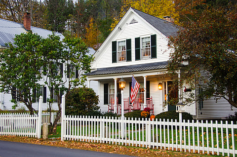 A house with a white picket fence