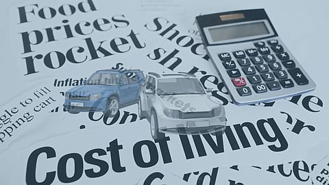 newspaper headlines about rising costs with 2 cars overlaid and slightly transparent, symbolizing increasing financial pressure on Massachusetts households.