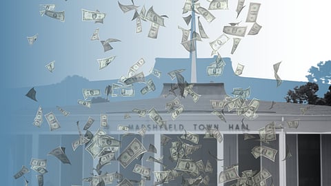 A picture of marshfield town hall, a while building with a spike on top, with money falling around and a blue fade across from left to right