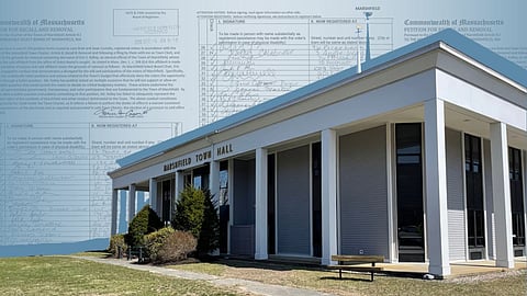 recall petition is behind the town hall of marshfield a white building with columns
