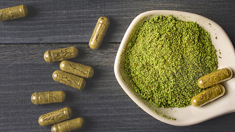 image of green powder and capsules standing in for an image of the drug krater 