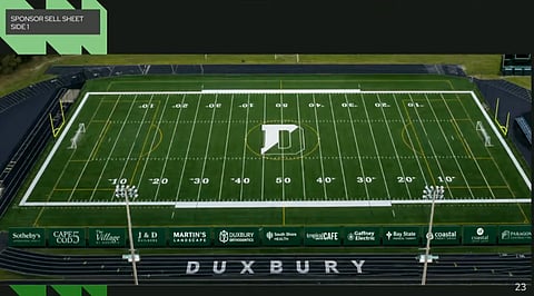 rendering of what advertising could look like at duxbury high school football field, green field with green banners with white lettering 
