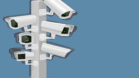 Surveillance cameras on a pole. 
