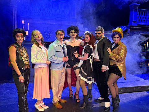 Cast of Rocky Horror Show in full costume at Company Theatre 