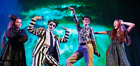 the cast of Beetlejuice jr pose in full costume