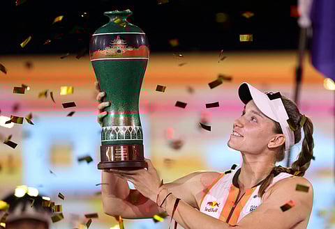 Elena Rybakina poses with the trophy after winning the Ningbo Open