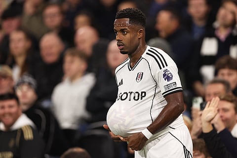 Fulham's Ryan Sessegnon prepares to take a throw in