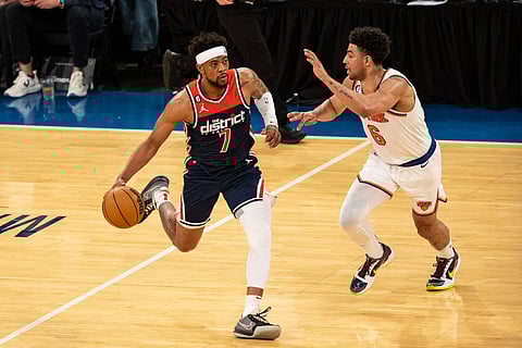 New York Knicks and Washington Wizards players in action