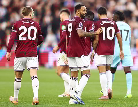 West Ham United players celebrate after a goal