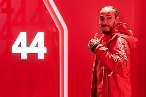 Lewis Hamilton poses for a photograph