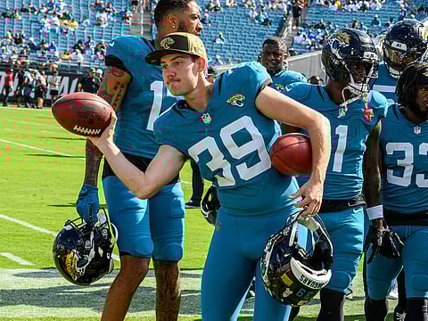 Jacksonville Jaguars' players interact with the fans
